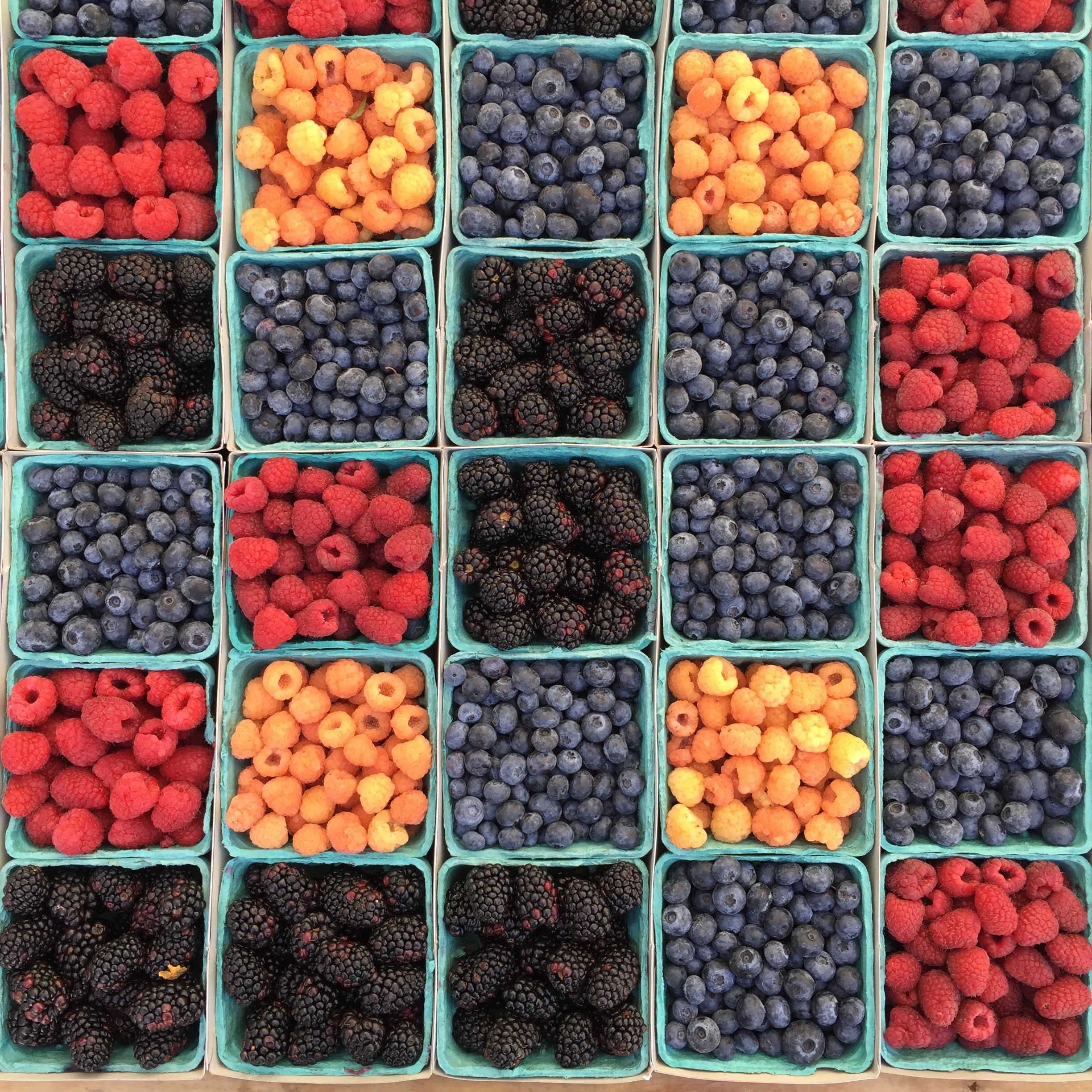 boxes of fruit at farmer's market